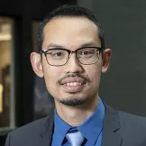 Headhsot of Izzuddin Aris