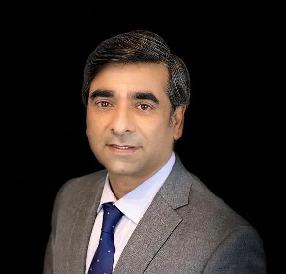 Headhsot of Anjum Khurshid