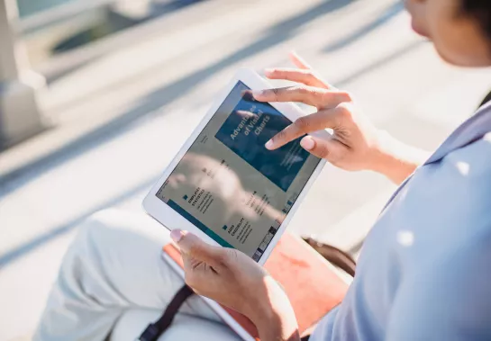 Woman reading on a tablet