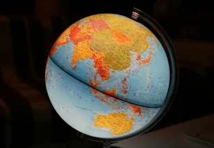 Illuminate globe of planet Earth is shown against a black backdrop