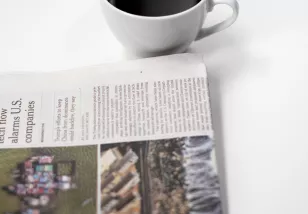 Newspaper and coffee