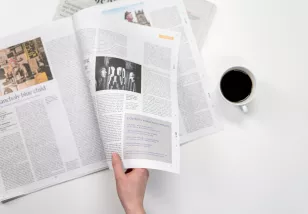 reading newspaper with coffee