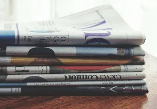 newspapers stacked