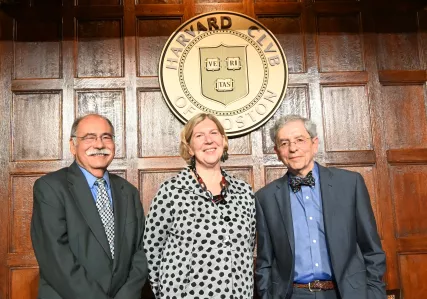 All three past and present leaders of the Institute pose together for a photo.
