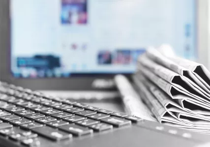 computer and newspapers