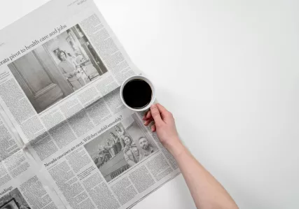 Newspaper and coffee