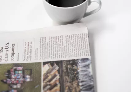 Newspaper and coffee