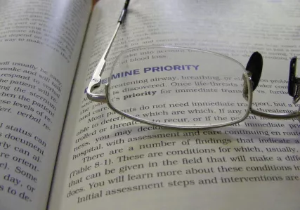 glasses on medical journal article